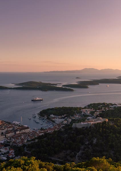 Pakleni Islands off Hvar Town with Vis Island in the distance